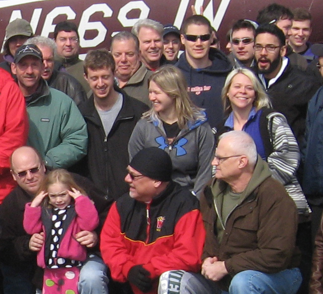 portion of group at airplane